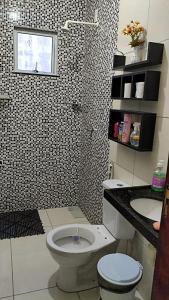 Koupelna v ubytování Morada Valentim Casa climatizada em Paracuru