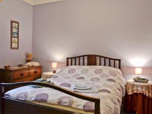 Ένα ή περισσότερα κρεβάτια σε δωμάτιο στο Ewes Schoolhouse