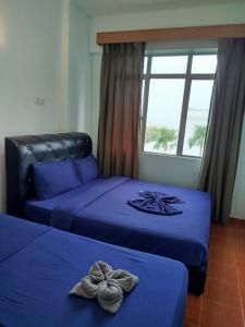 Postel nebo postele na pokoji v ubytování Glory Beach Resort Beach View + 159 fotografií