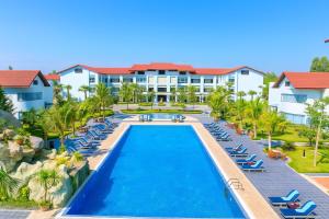an image of the pool at the resort at EG Paradise Angkor Villa Hotel in Siem Reap