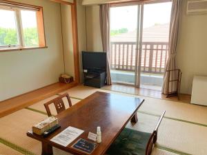 Μια τηλεόραση ή/και κέντρο ψυχαγωγίας στο 芸西村の家 +26 φωτογραφίες