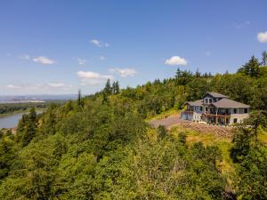 an aerial view of a house on top of a hill at Eagles Bluff 1BR Suite of Kalama Oaks Lodge in Kelso