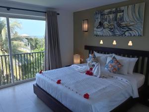 Postel nebo postele na pokoji v ubytování Riviera Tide + 81 fotografií