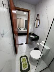 Koupelna v ubytování Monoambiente Familia Borch! Aconchego e Conforto! + 21 fotografií