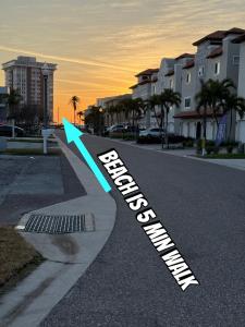 a street sign on the side of a road at Luxurious 3 bedrooms 2 bath Ultimate Beach Life! 5 min walk to beach! in St Pete Beach +28 photos
