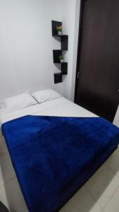 Postel nebo postele na pokoji v ubytování VACACIONES CON AROMA DE CAFÉ - Apartamento Vacacional cerca a Parque del Café