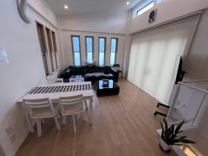 Postel nebo postele na pokoji v ubytování Kuzakura