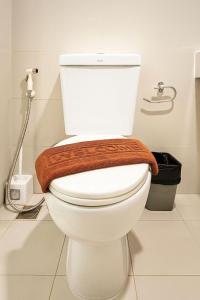 Koupelna v ubytování The Base酒店民宿预订 市中心 游泳池 健身房 海滩 度假屋 A-9F