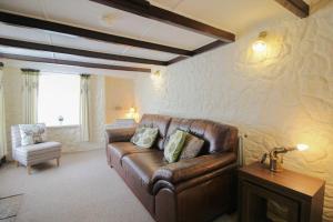 Et opholdsområde på Sunny Corner Cottage