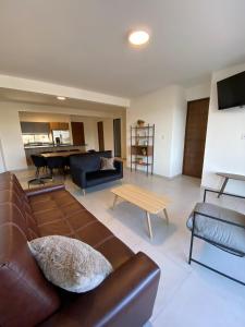 Χώρος καθιστικού στο Beautiful downtown apartment in San Luis Potosí
