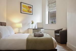 Ένα ή περισσότερα κρεβάτια σε δωμάτιο στο Central Hull Stay Self Check-In