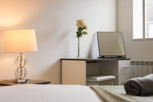 Ένα ή περισσότερα κρεβάτια σε δωμάτιο στο Central Hull Stay Self Check-In