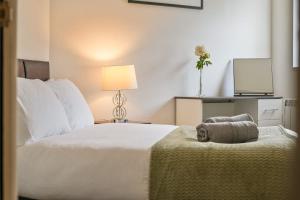 Ένα ή περισσότερα κρεβάτια σε δωμάτιο στο Central Hull Stay Self Check-In