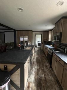 a kitchen with a sink and a counter top at Panther Creek retreat in Clarkesville