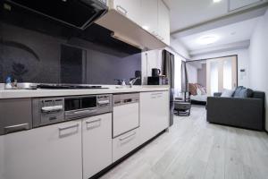 Η κουζίνα ή μικρή κουζίνα στο Mell-Theater鈍色の風