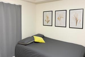 Ένα ή περισσότερα κρεβάτια σε δωμάτιο στο XeroB HOUSE FLOLIA602 フローリア