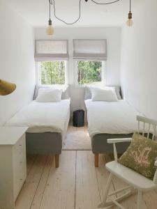 Postel nebo postele na pokoji v ubytování Idyllic Holiday Home With Scenic Views On Älgö