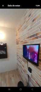 TV a/nebo společenská místnost v ubytování Casa Vista Linda Paty do Alferes