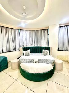 Postel nebo postele na pokoji v ubytování Hotel Apple Inn