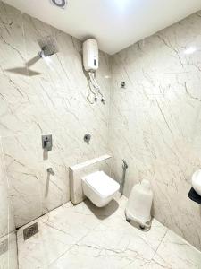 Koupelna v ubytování Hotel Apple Inn