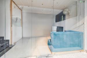 Posezení v ubytování Super Townhouse Bairhana Road Prayagraj + 23 fotografií