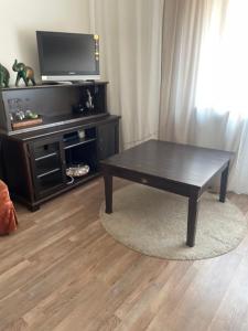 TV a/nebo společenská místnost v ubytování City Apartment