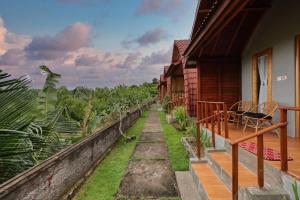 Balkón nebo terasa v ubytování D Sebuluh Bungalow