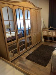 Postel nebo postele na pokoji v ubytování City Apartment + 4 fotografie