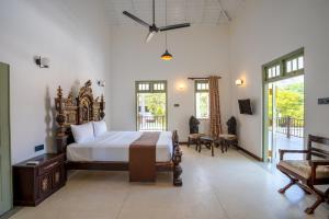 Ένα ή περισσότερα κρεβάτια σε δωμάτιο στο Amara Chairmans Bungalow +30 φωτογραφίες