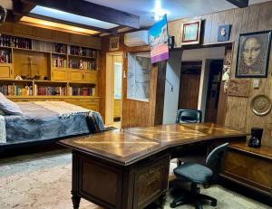 Una cama o camas en una habitación de SUITE 0, Centro de Cuauhtémoc Chihuahua 14 fotos más