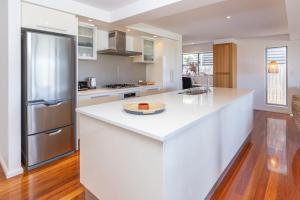 Kuchyň nebo kuchyňský kout v ubytování Blueys Bliss 2 + 7 fotografií