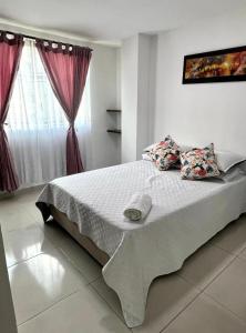 Postel nebo postele na pokoji v ubytování Confort y Ubicación Central - Apartamento en Bucaramanga - 2 Habitaciones