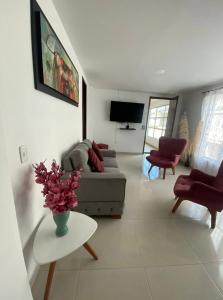 TV a/nebo společenská místnost v ubytování Confort y Ubicación Central - Apartamento en Bucaramanga - 2 Habitaciones