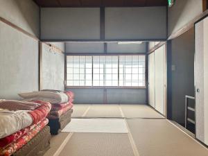 Χώρος καθιστικού στο 漆喰の宿 東本