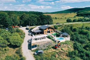 an aerial view of a house with a pool at Cabana Athos in Zalău