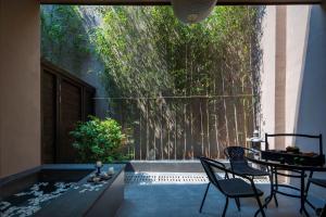 Μπαλκόνι ή βεράντα στο Pushe Renmei Hotel 蒲舍酒店 +20 φωτογραφίες