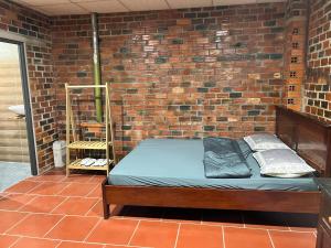 Postel nebo postele na pokoji v ubytování Homestay Sỏi Đá - Tây Ninh + 42 fotografií