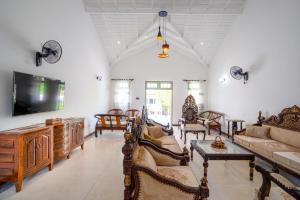 Μια τηλεόραση ή/και κέντρο ψυχαγωγίας στο Amara Chairmans Bungalow