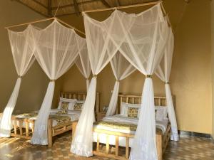 Postel nebo postele na pokoji v ubytování Stevalyn's Ridge View Lodge