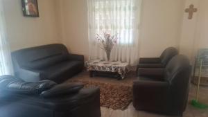 Posezení v ubytování St Michael View + 1 fotografie