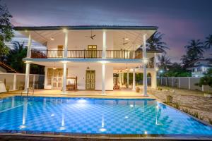 Πισίνα στο ή κοντά στο Amara Chairmans Bungalow