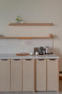 Η κουζίνα ή μικρή κουζίνα στο Vivere Azure