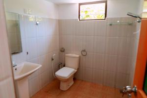 Koupelna v ubytování WindGet Villa