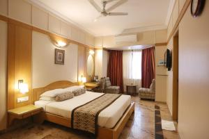 Postel nebo postele na pokoji v ubytování Pai Viceroy + 5 fotografií