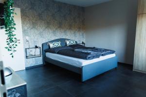 Postel nebo postele na pokoji v ubytování Ferienwohnung Empt Vussem