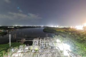 a view of a river at night at Hotel Galaxy Park in Shamshabad