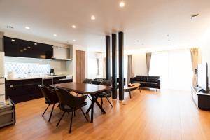 O bucătărie sau chicinetă la スターレジデント