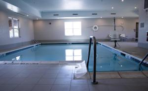 a large swimming pool in a building at Country Inn & Suites by Radisson, Carlisle, PA in Carlisle