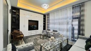 a living room with a couch and a table at Welcome to your home away from home! in Kabul