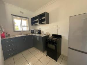 Kuchyň nebo kuchyňský kout v ubytování HinterlandLodge